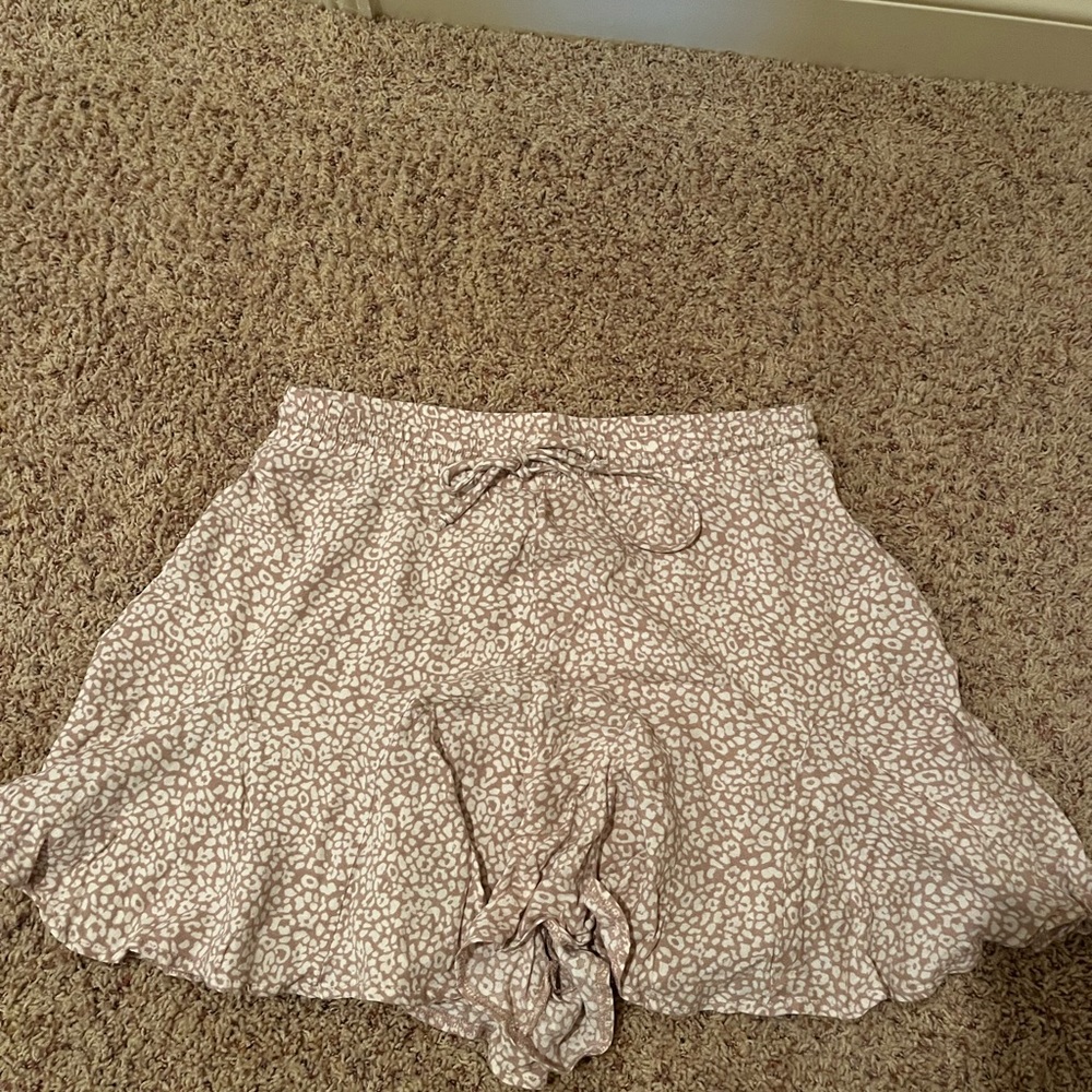 Pink and white women’s size M shorts